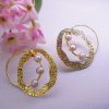 Hammered brass layout with pearls